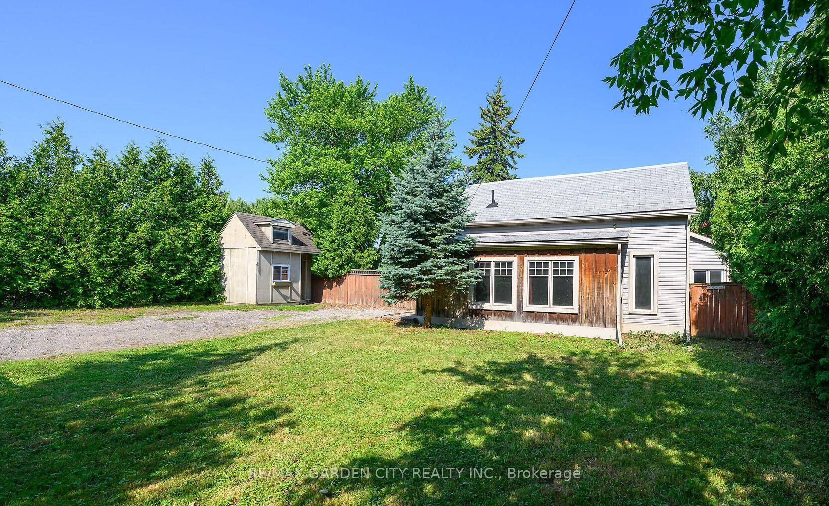 CHARMING 3 BEDROOM HOME located on the hill surrounded by trees !