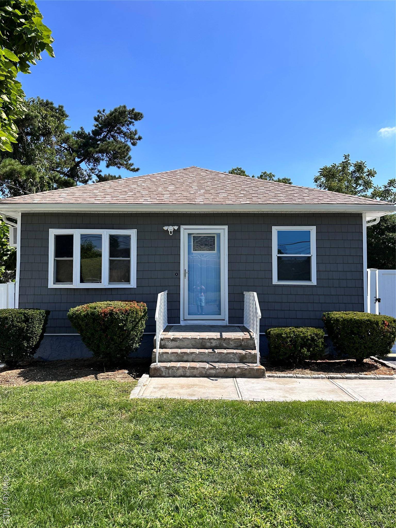 Total Remodeled Inside and Outside, New Kitchen with Quartz Counter Tops with Lifetime Warranty Transferable to New Owner, New Appliances, New Bathrooms, New Roof, New Doors Inside and Outside New ...