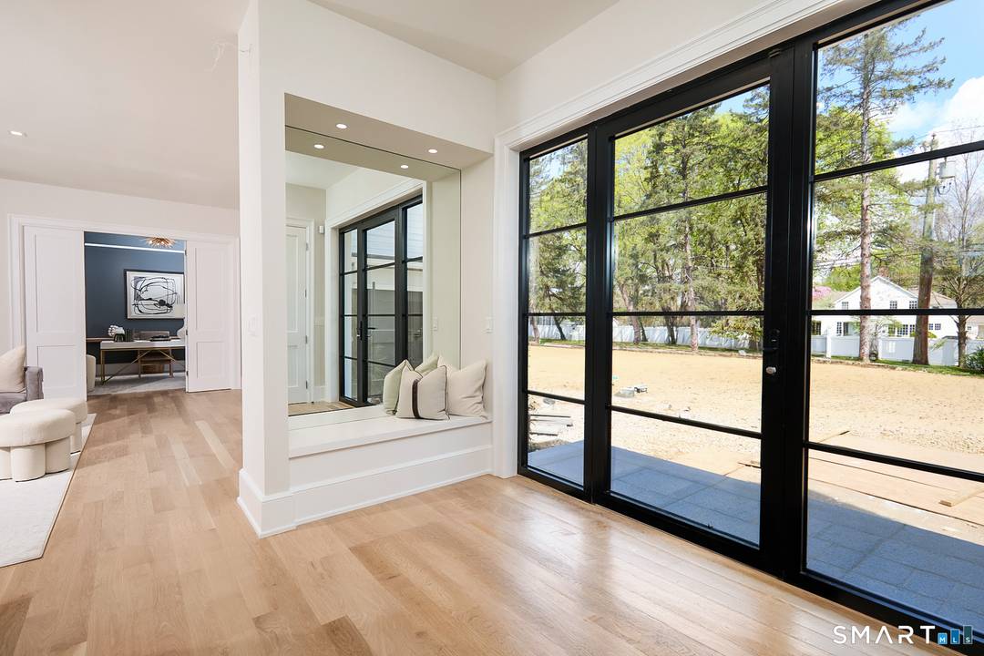 Just completed and ready for immediate occupancy, this beautifully crafted new construction home is set on a quiet cul de sac in the desirable Greens Farms area.