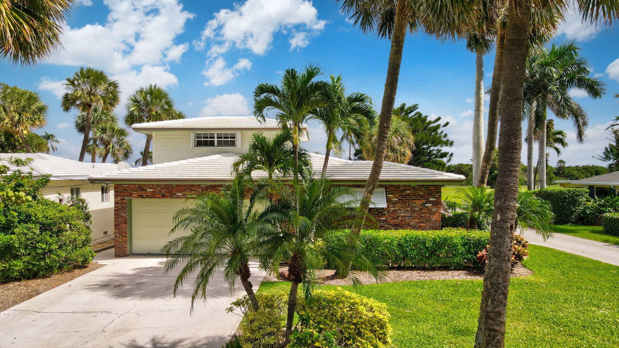 This inviting corner lot home in the historic district of East Lake Worth Beach offers a perfect mix of character and modern updates.