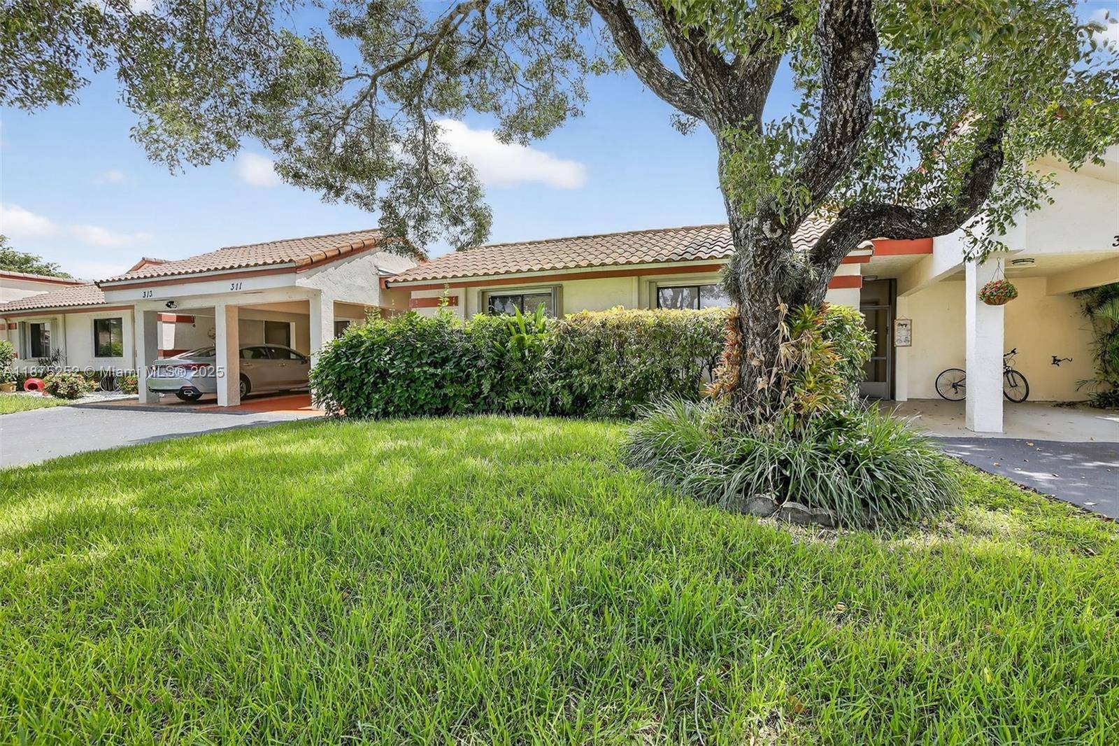 Amazing 3 2 lakefront villa offers all tile flooring, updated kitchen and baths, a private atrium and huge screened patio overlooking the sparkling water.