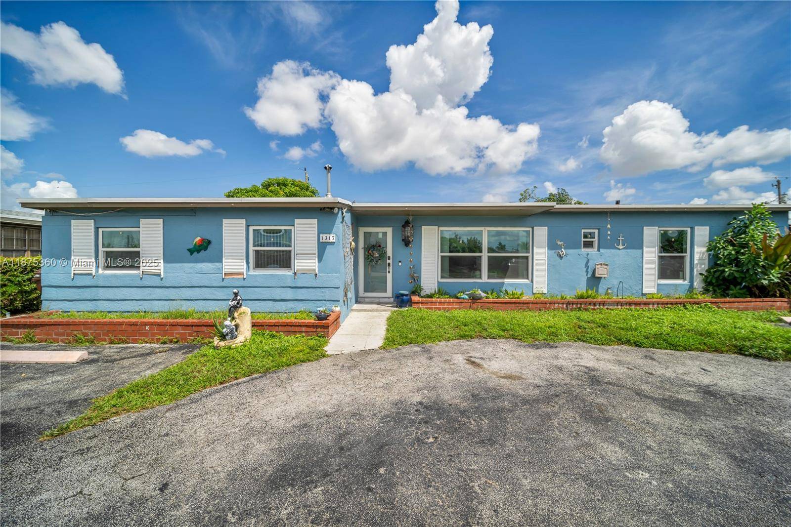 Exquisite 5 bedroom pool home in West Hialeah this large single family home features 5 bedrooms 2 bathrooms with Impact windows and Solar Panel to heat the pool.