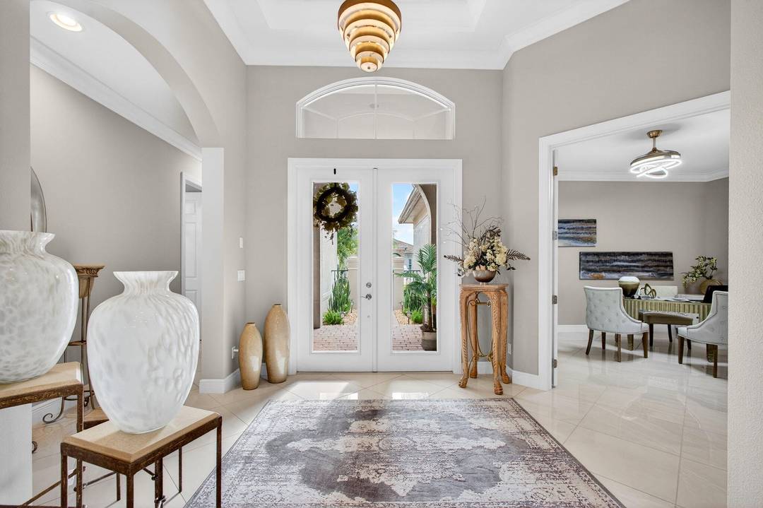 Welcome to an exceptional Collina model residence within Cresswind at PGA Verano, a premier 55 community offering refined living and outstanding amenities.