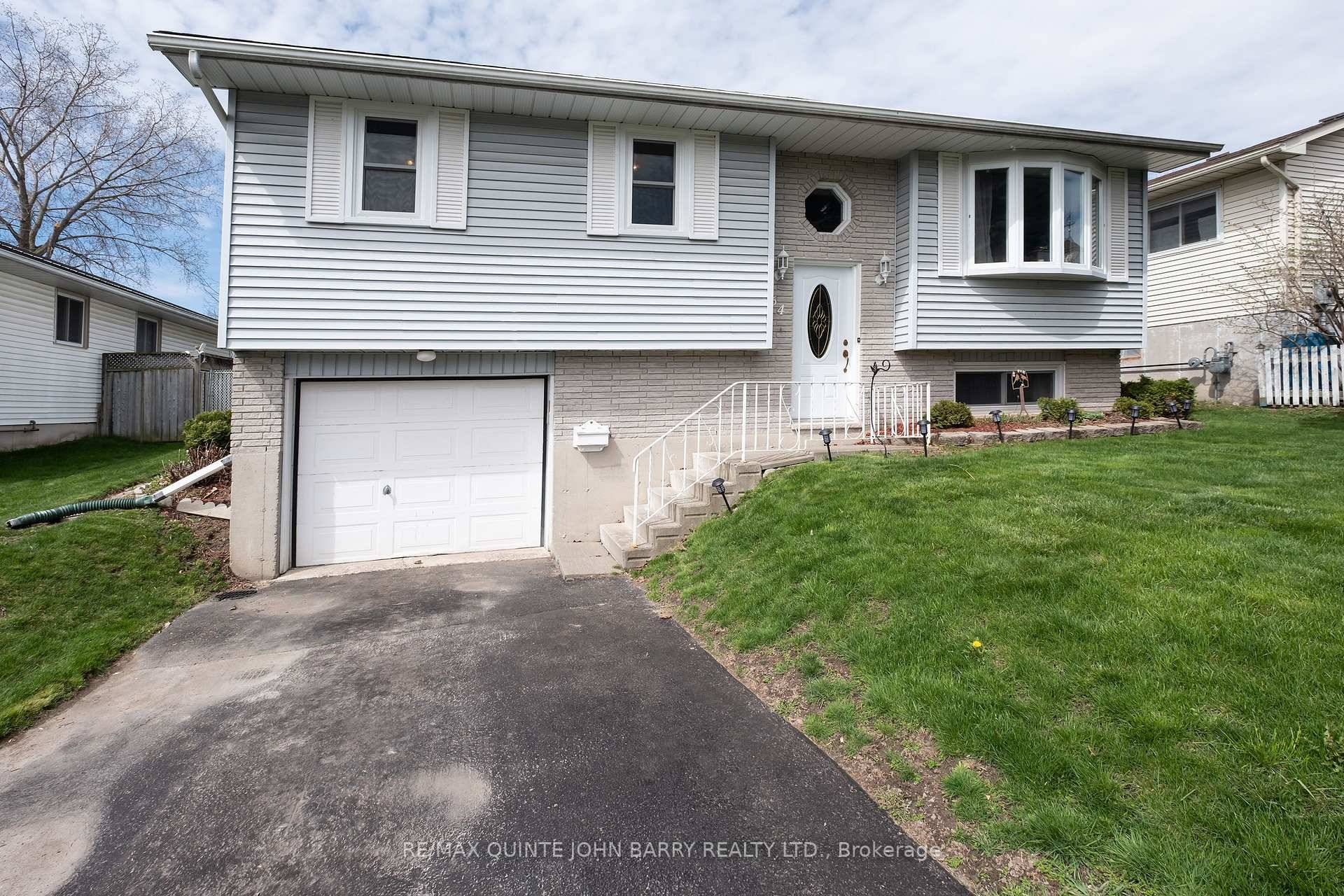 Quick access to Hwy 401 and all local amenities make this home a must see !