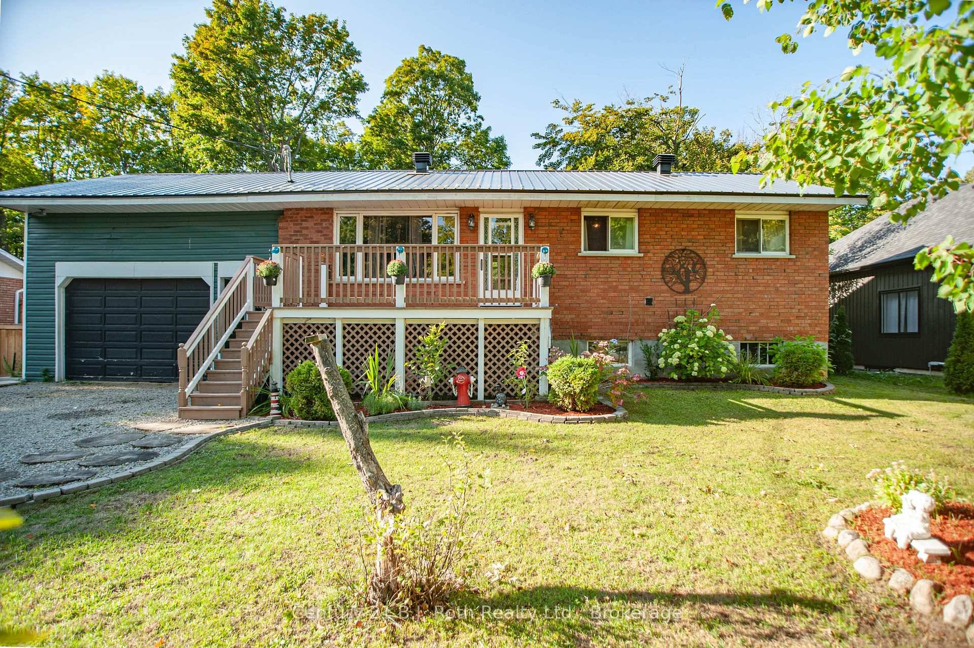 This charming 3 2 bedroom raised bungalow offers the perfect balance of comfort, functionality, and outdoor living.
