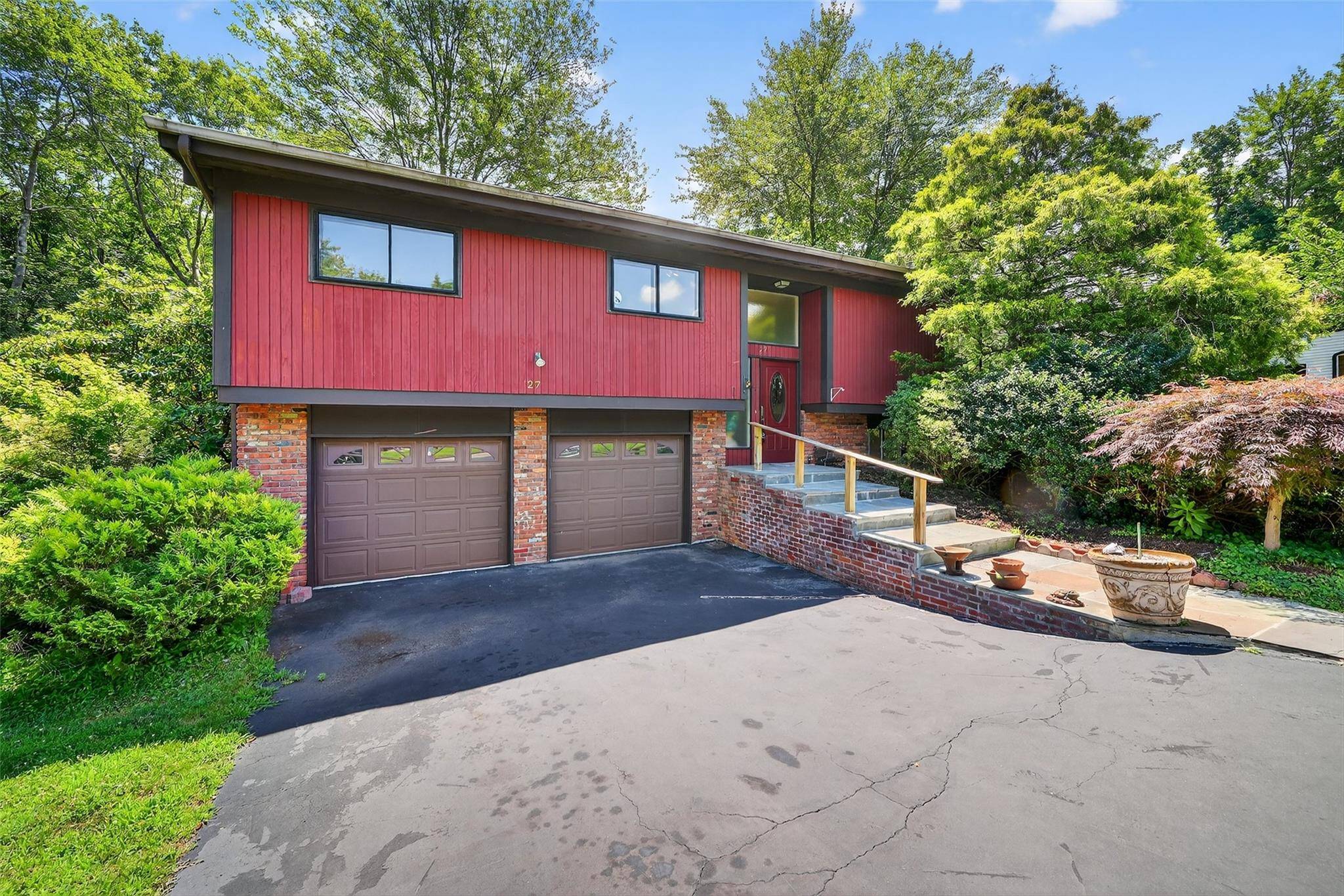 This expansive sunlit ranch style home offers 4 bedrooms, 2 1 2 bathrooms, and over2, 050 sq ft of thoughtful living space on 0.