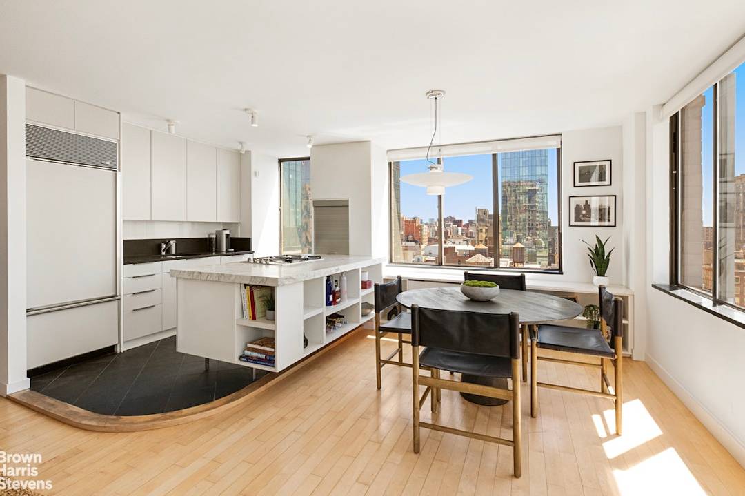 SUN DRENCHED 2 BR w Balcony Perched high above the city at the coveted Madison Green Condominium, this renovated corner two bedroom, two bath home offers exceptional light, open skyline ...