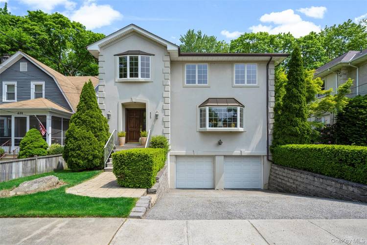 Rye Neck sun filled Colonial that you will be thrilled to call home.