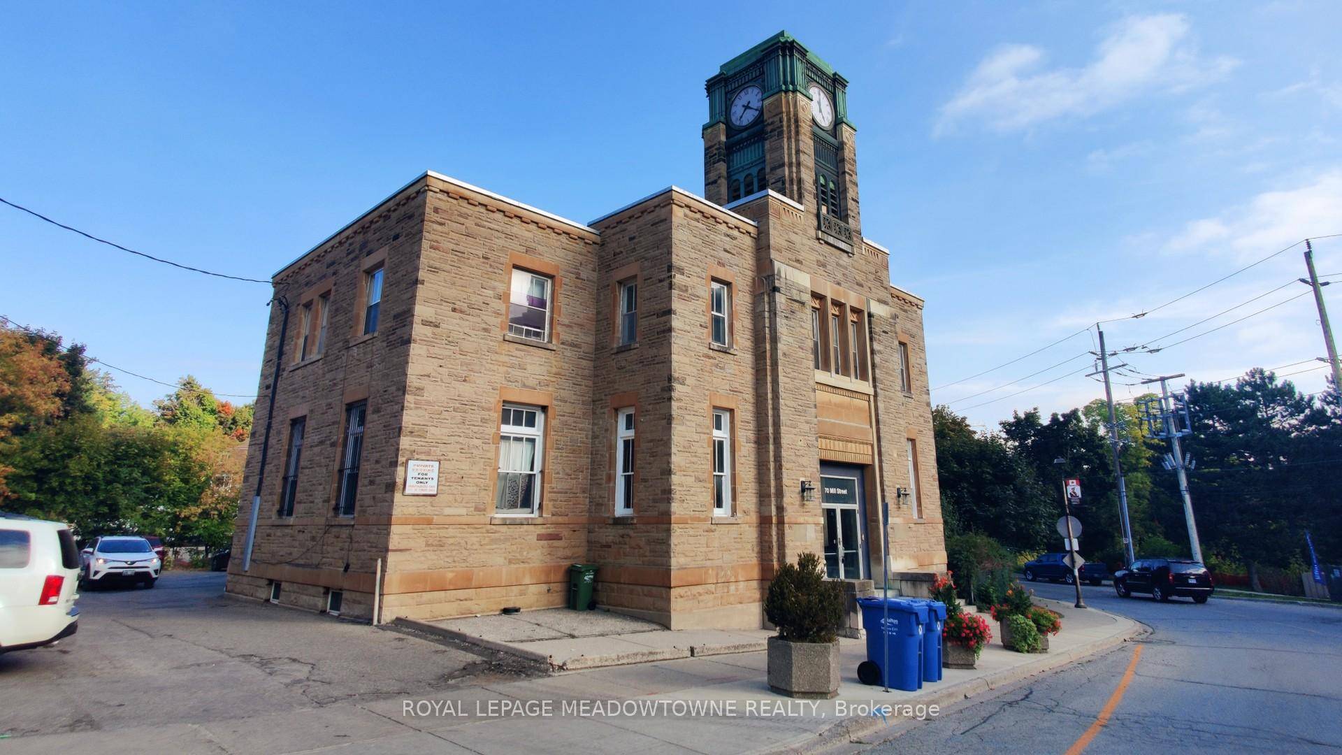 MULTI RESIDENTIAL INVESTMENT OPPORTUNITY Majestic Post Office with 11 residential apartment building, featuring high ceilings, elegant baseboards and large windows.