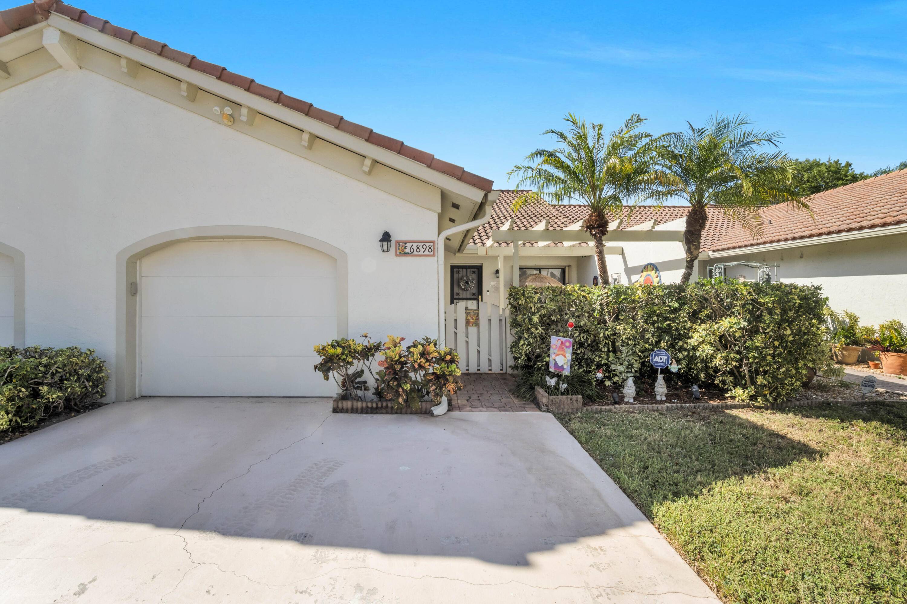 Welcome to Tiburon II ! This Boca Raton gem offers the perfect blend of style and comfort with open living spaces, updated finishes, and private outdoor charm.