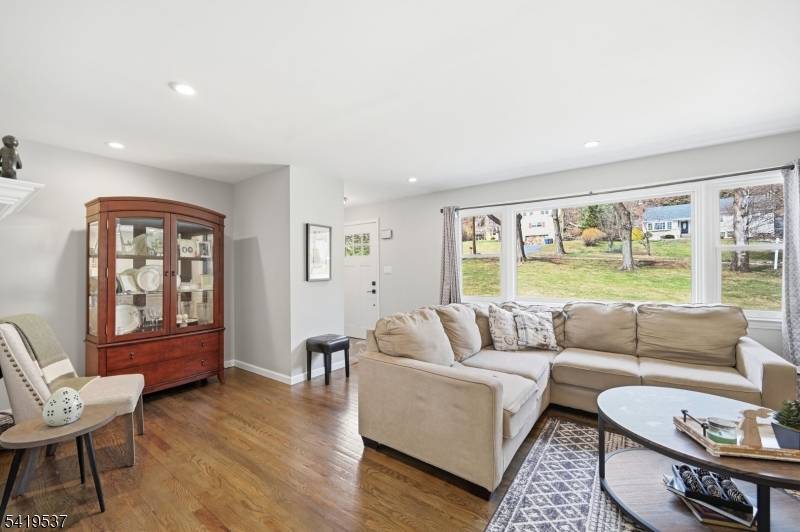 Nestled on over 1 2 acre in highly sought after Morris Township, this beautifully maintained raised ranch offers the perfect blend of space, comfort, and modern living.