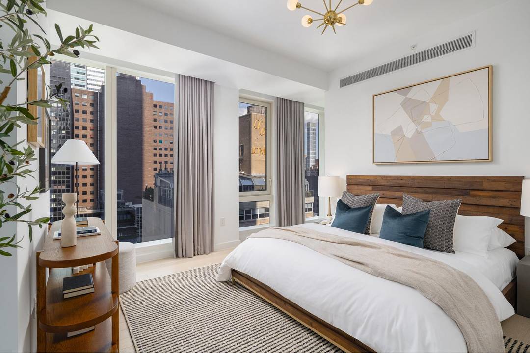 Immediate Occupancy. This expansive one bedroom, one and a half bathroom residence designed by Champalimaud offers northern, western, and southern exposures through floor to ceiling windows.