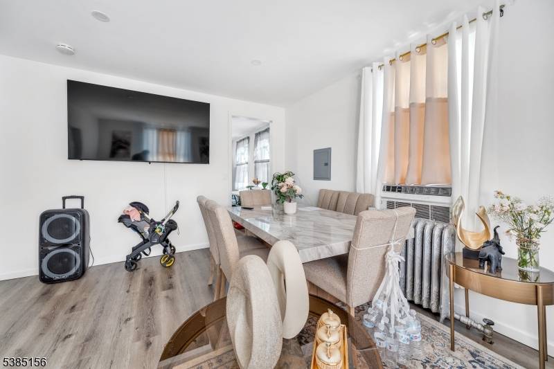 Discover this beautifully maintained three family residence with approximately 3, 000 square feet offering a total of 7 spacious bedrooms and 4 full bathrooms.