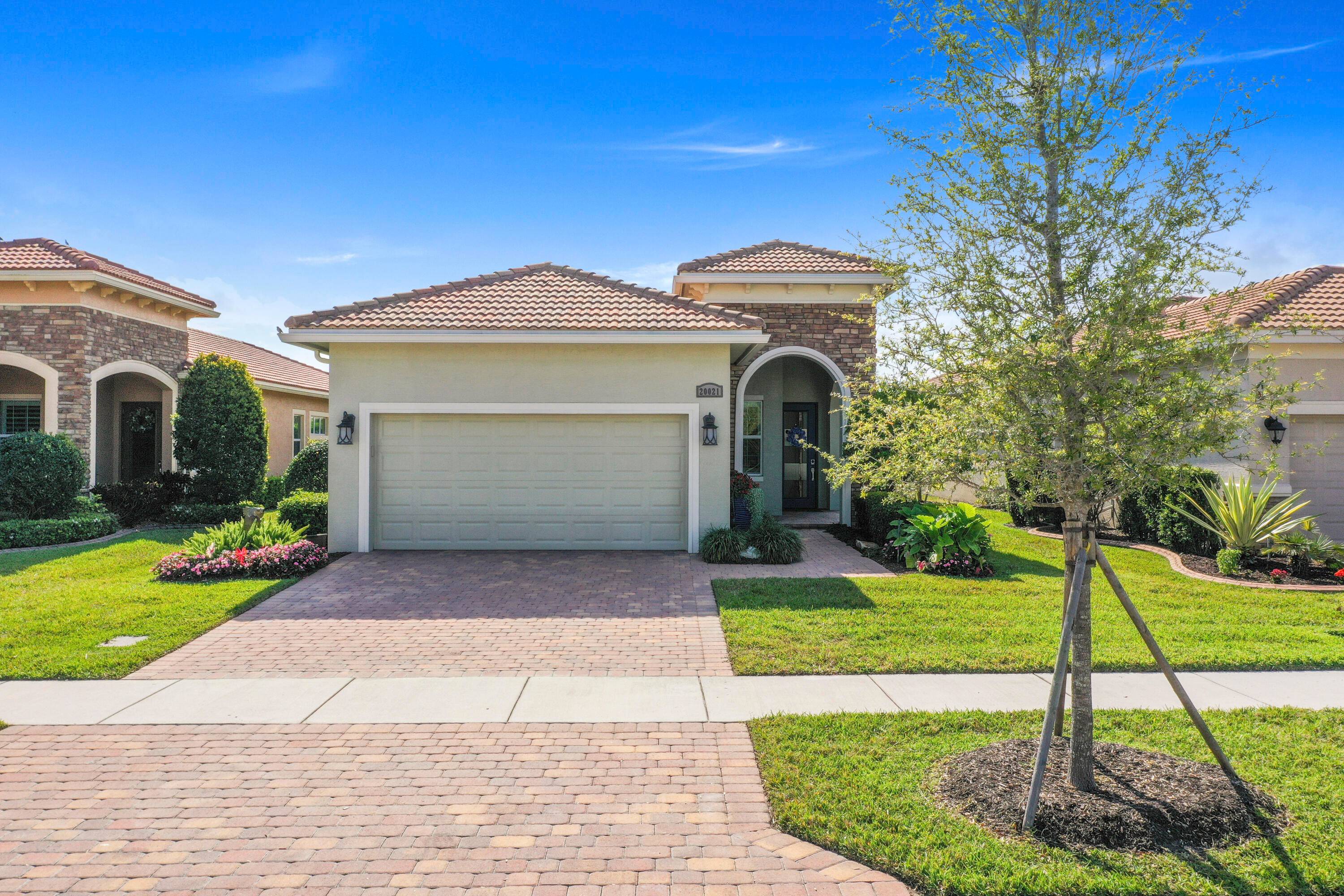 This stunning home with a long water view shows like a model home.