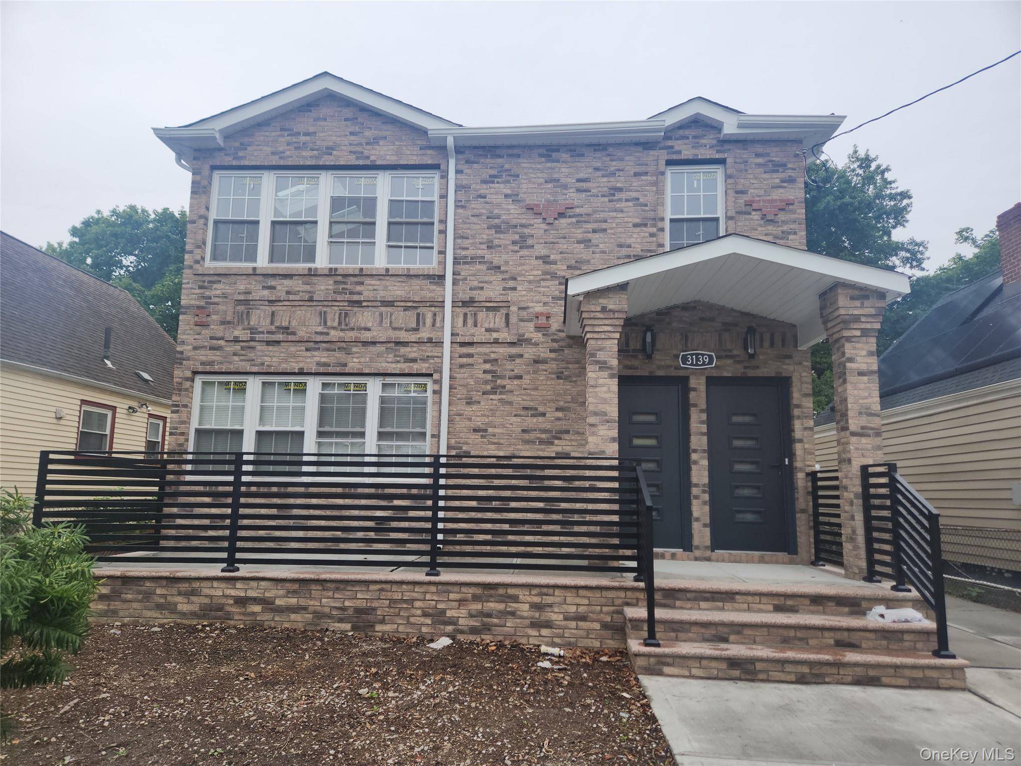 Beautiful Detached Brick 2 Family with Finished basement, Driveway and Garage.