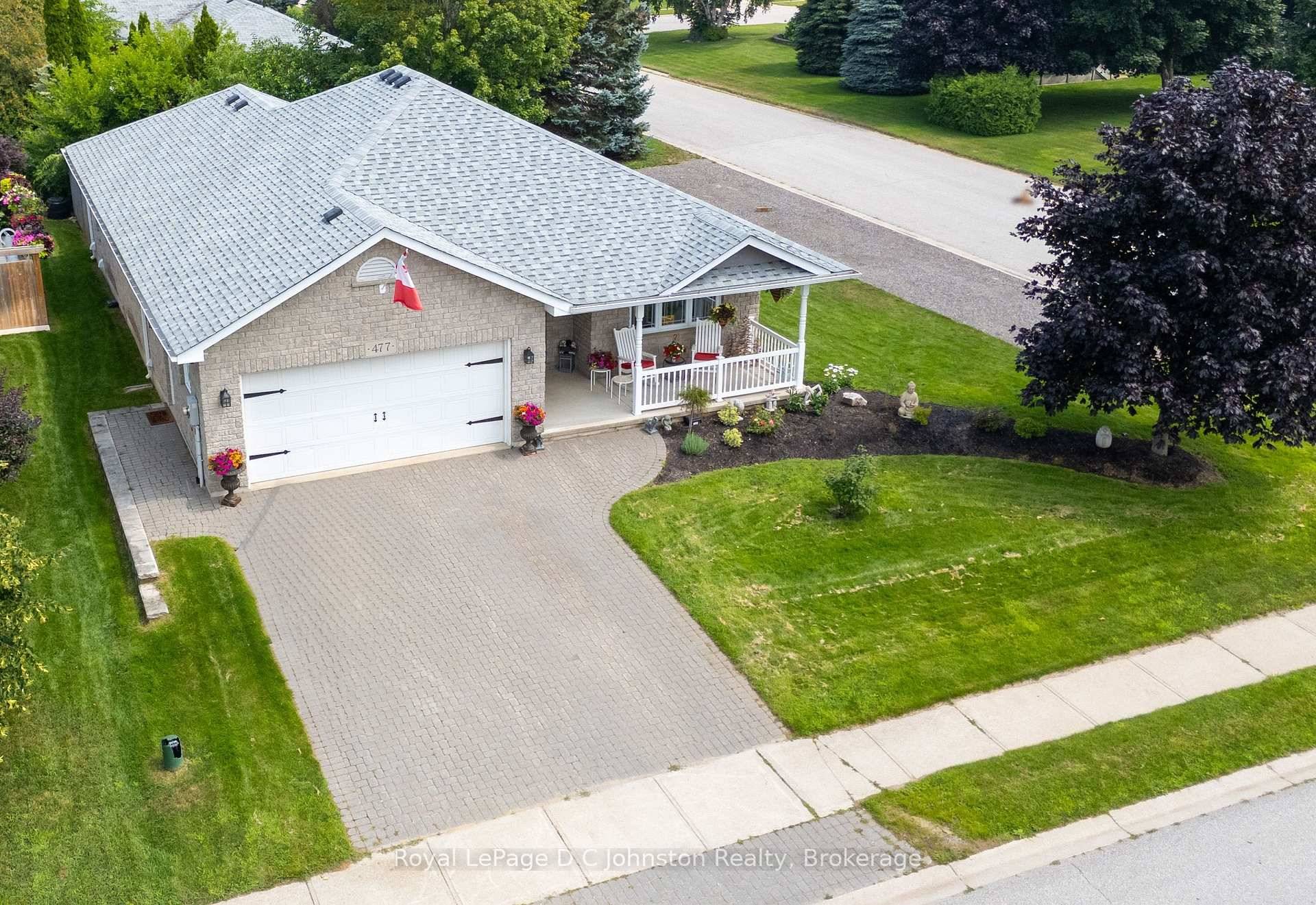 Welcome to this custom Beldman Built stone bungalow on a spacious corner lot in a much sought after area of Port Elgin.