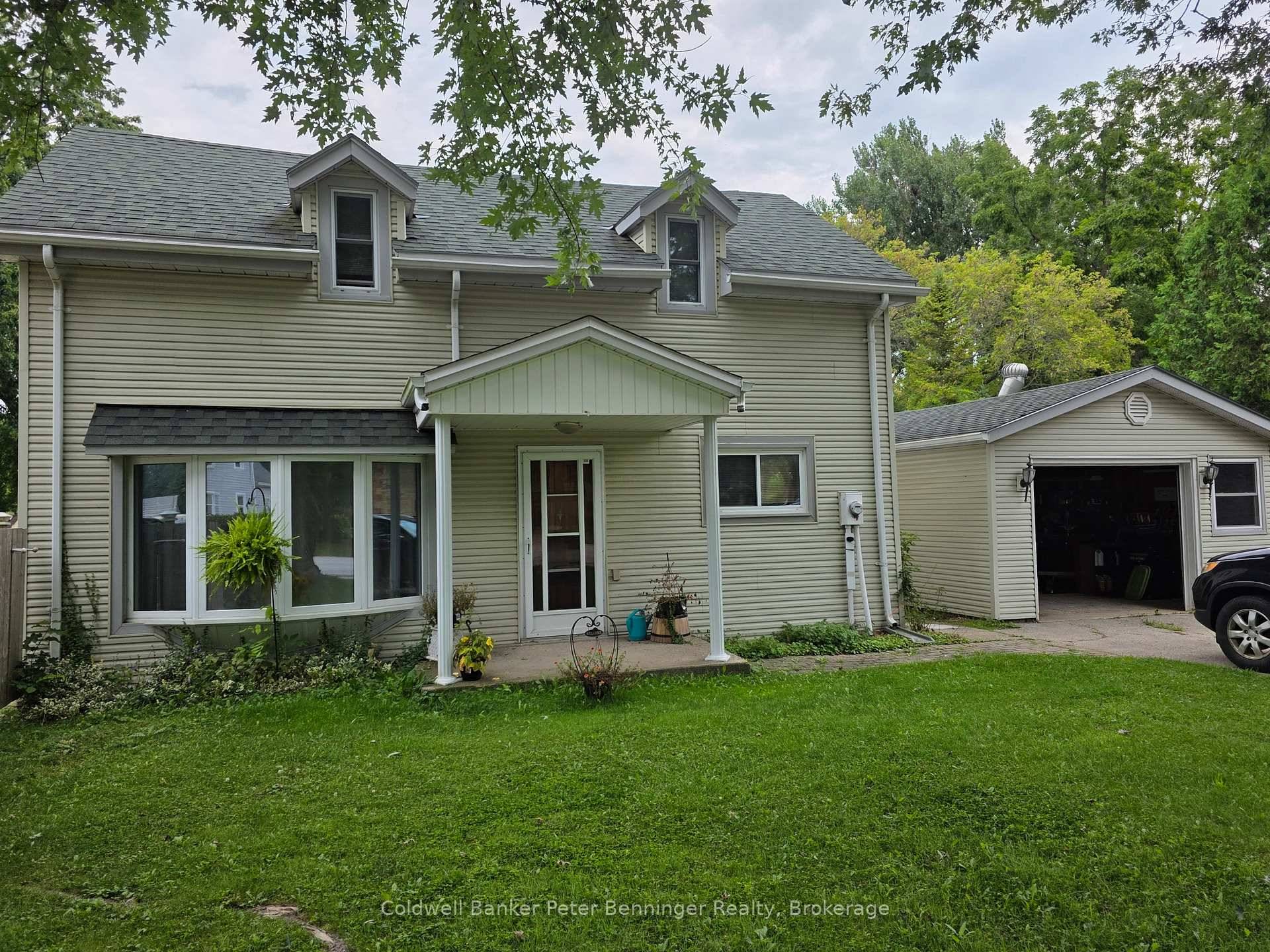 Charming clean curb appeal with this home that is larger than it looks, nestled in the Village of Paisley.