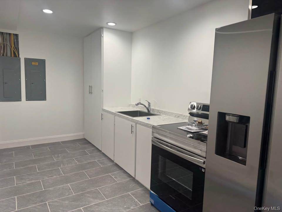 Newly renovated three bedroom, 1 full bath open floor plan, lower level all utilities included.