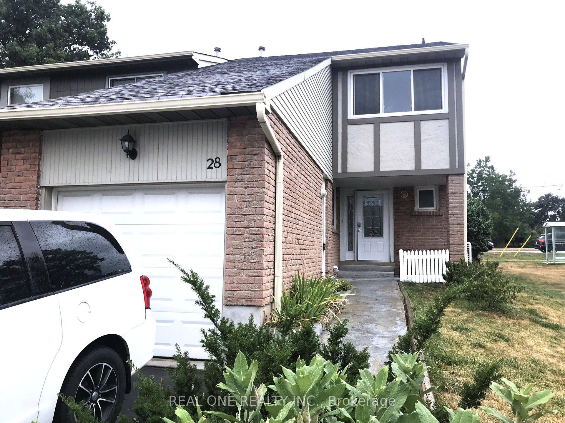 Welcome to 1580 Lancaster Dr Unit 28, a beautifully updated semi detached home in the heart of Oakville's highly desirable Iroquois Ridge South community.