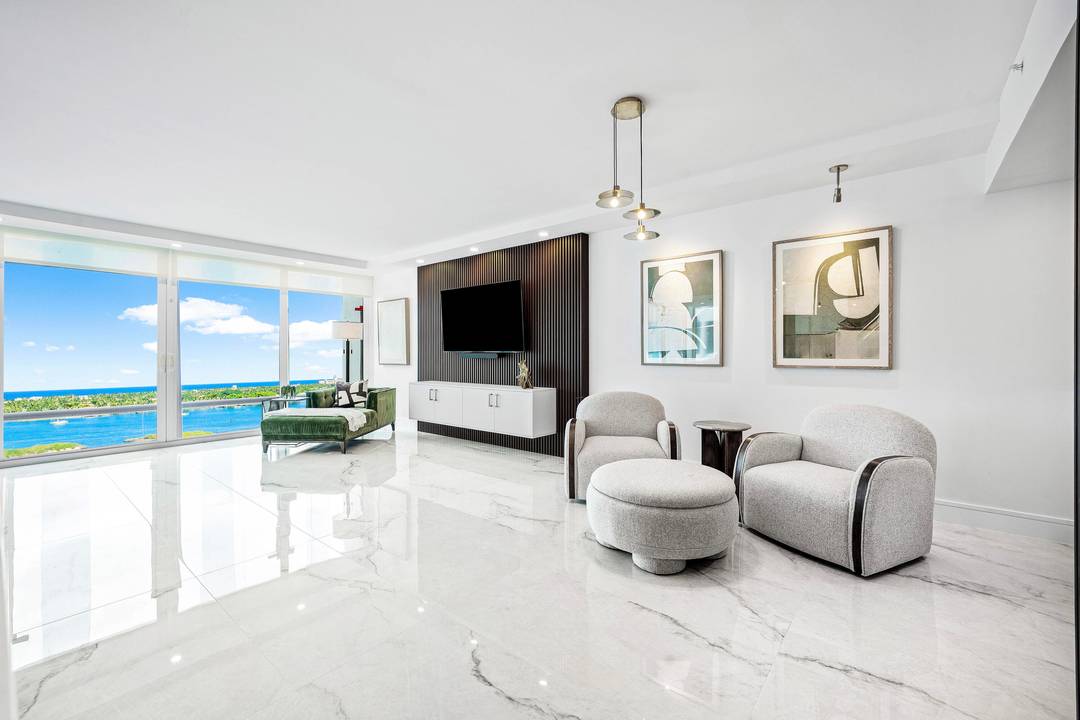 Step into a masterfully redesigned 2, 091sqft residence at The Plaza, offering breathtaking ocean, intracoastal, and sunset city views from an ultra luxury, east to west layout.