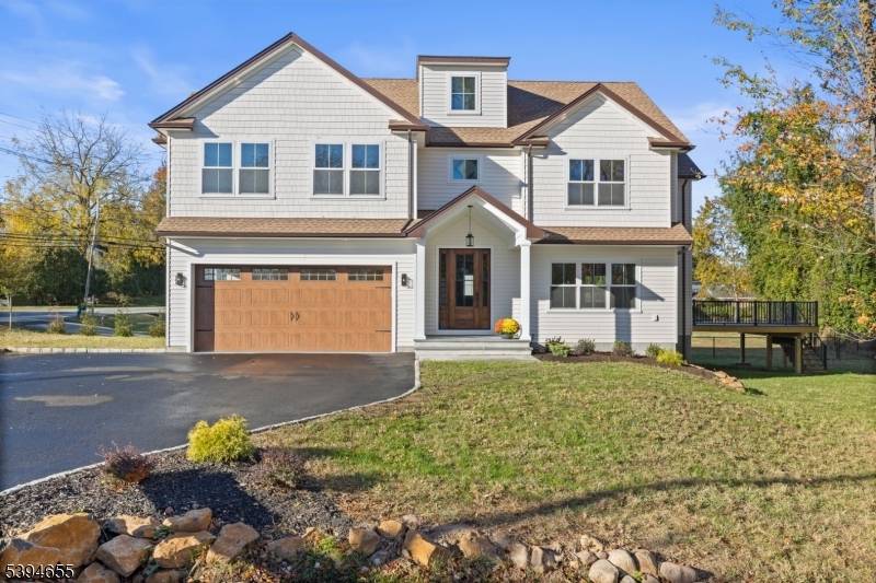 Step into timeless luxury at 1 Willow Place, a stunning new construction offering four finished levels of refined living.