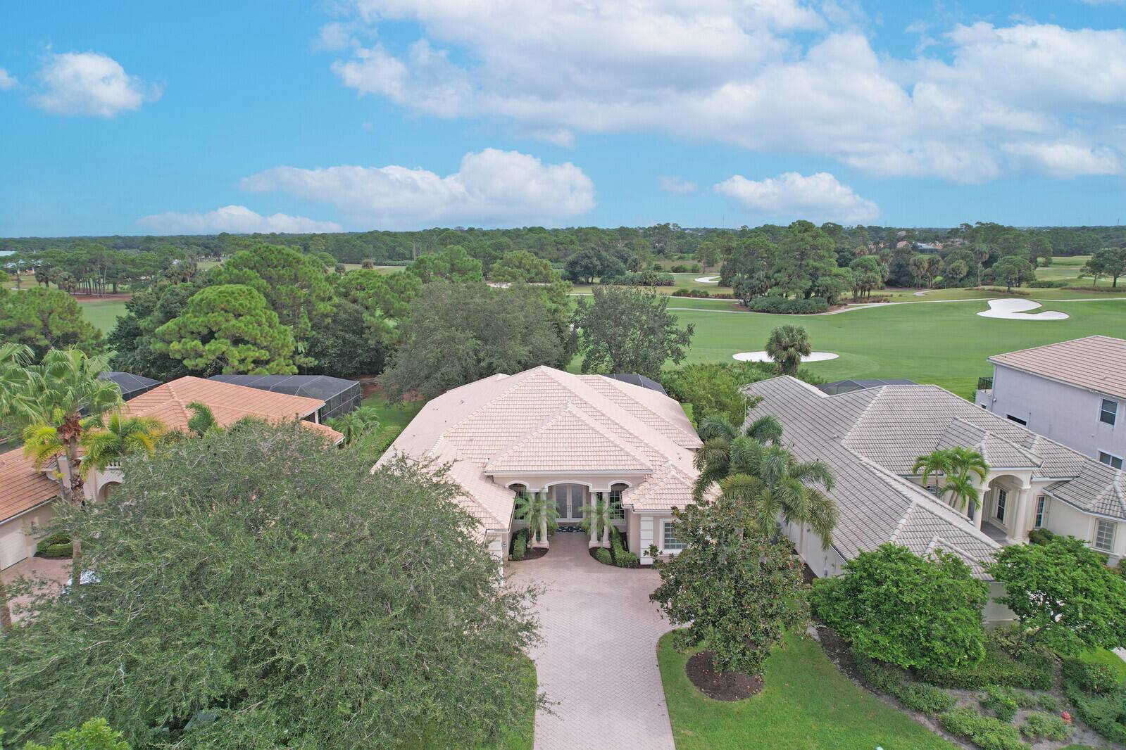 STUNNING POOL HOME WITH SWEEPING GOLF COURSE VIEW IN PGA VILLAGE !