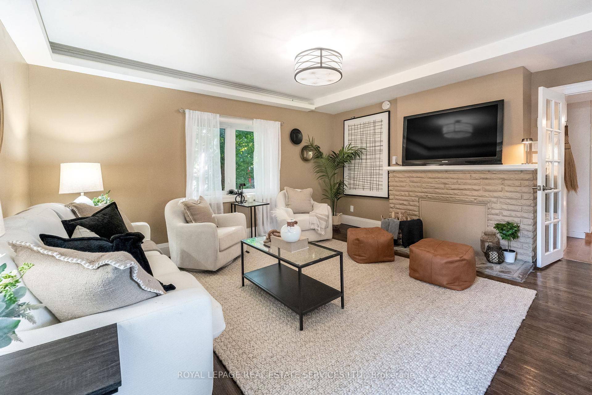 Discover a truly unique home with two front entrances, private parking for two, and a welcoming front yard to enjoy with family and friends.