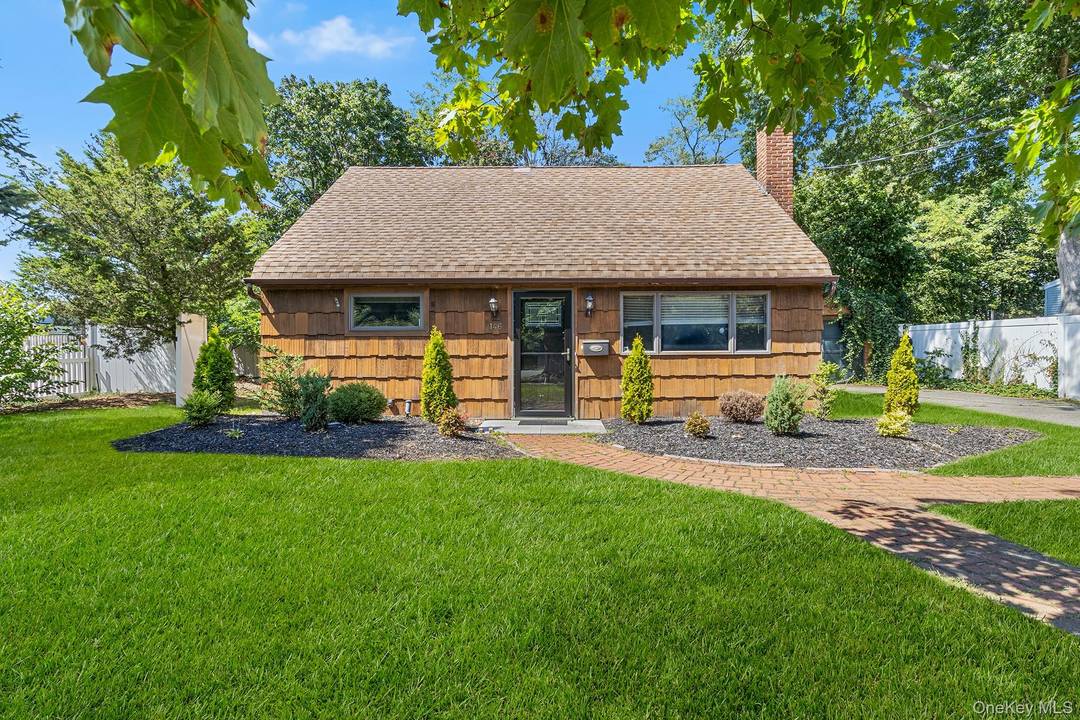Welcome to this charming Cape in Farmingdale, showcasing beautiful cedar shingle siding, a brick walkway, and undeniable curb appeal.