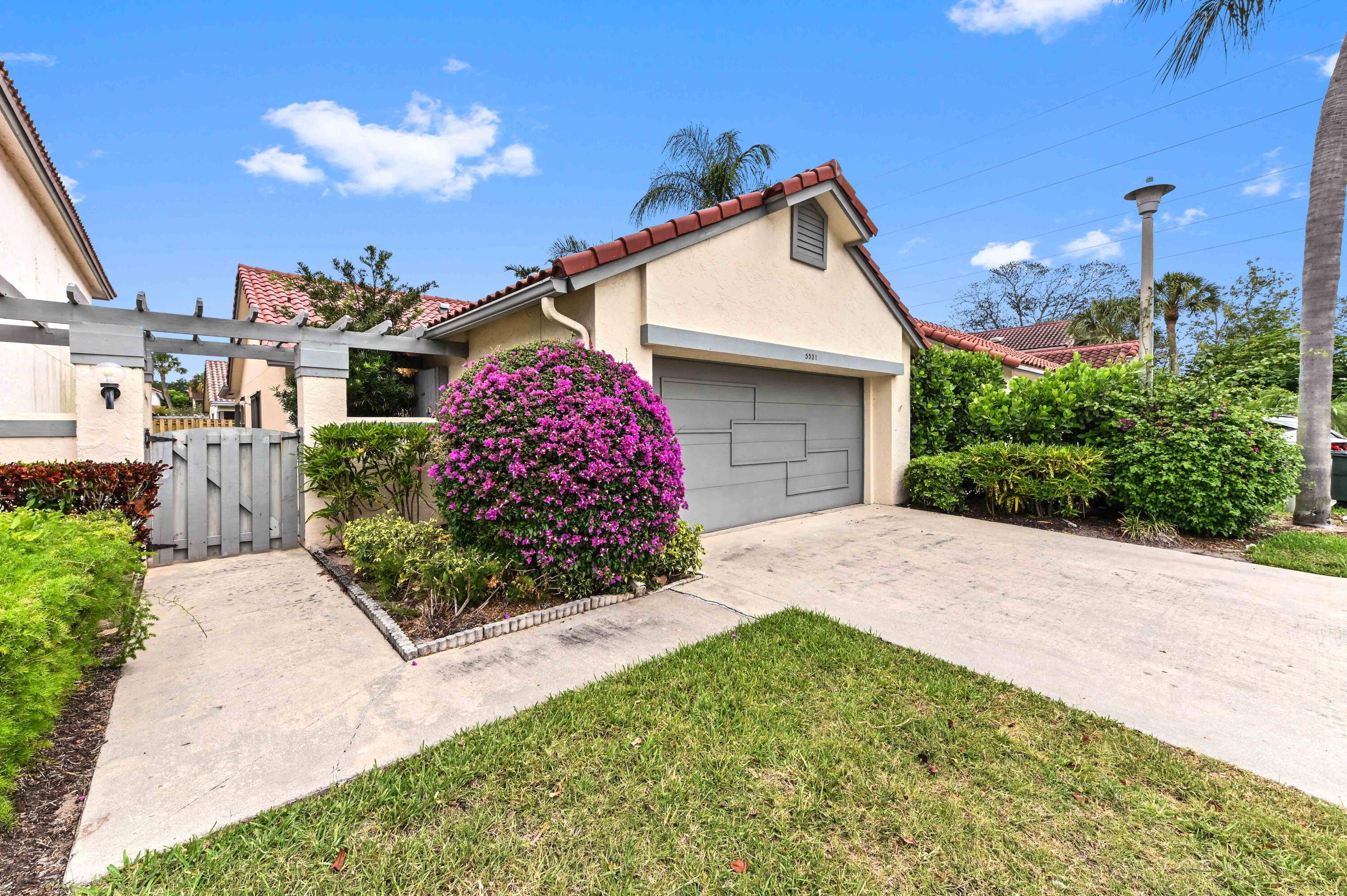 Tucked away on a quiet interior lot, this terrific home offers both privacy and charm in a beautifully maintained community.