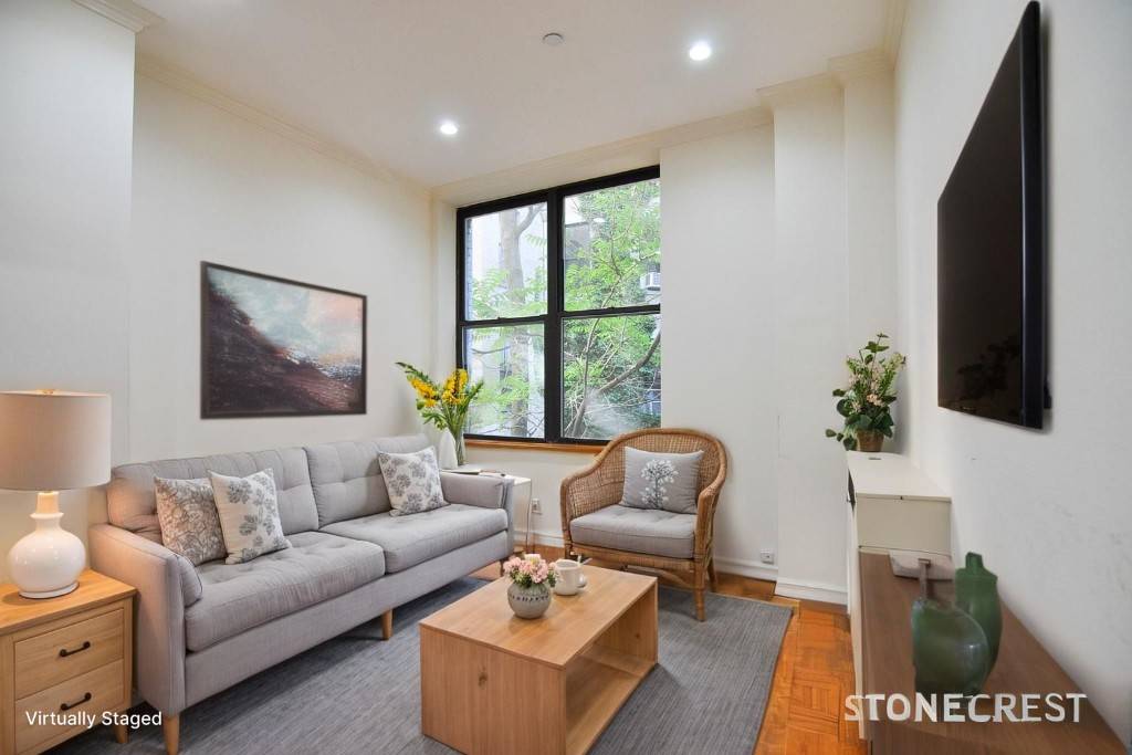 Sunny south. facing renovated large one bedroom apartment with extra high ceilings in a well kept doorman building.