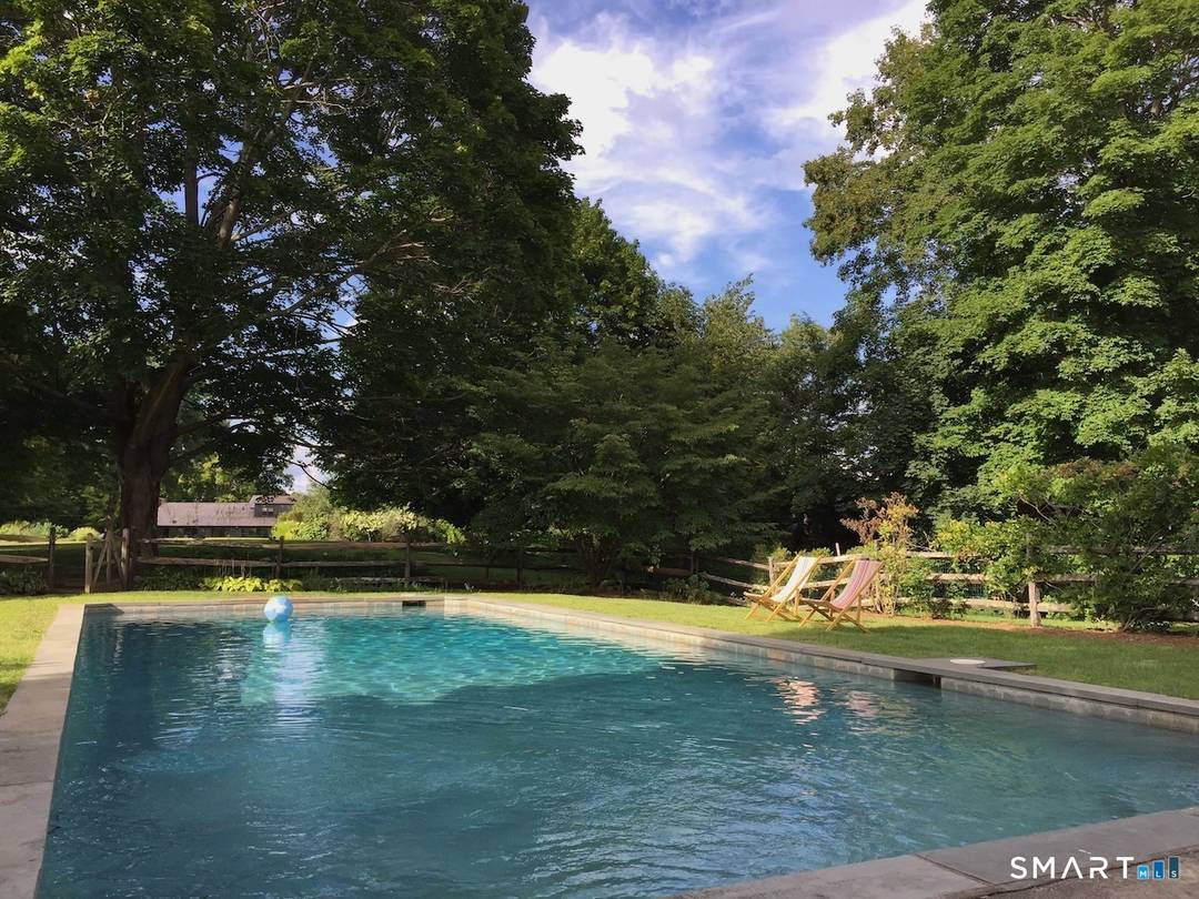 Experience an exceptional seasonal retreat in the coveted Taconic section of Salisbury, CT.