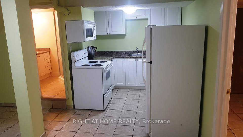 Spacious renovated 1 bedroom basement apartment with large living room, bedroom, kitchen and washroom in a quiet area of North York, close to Finch and Bathurst.