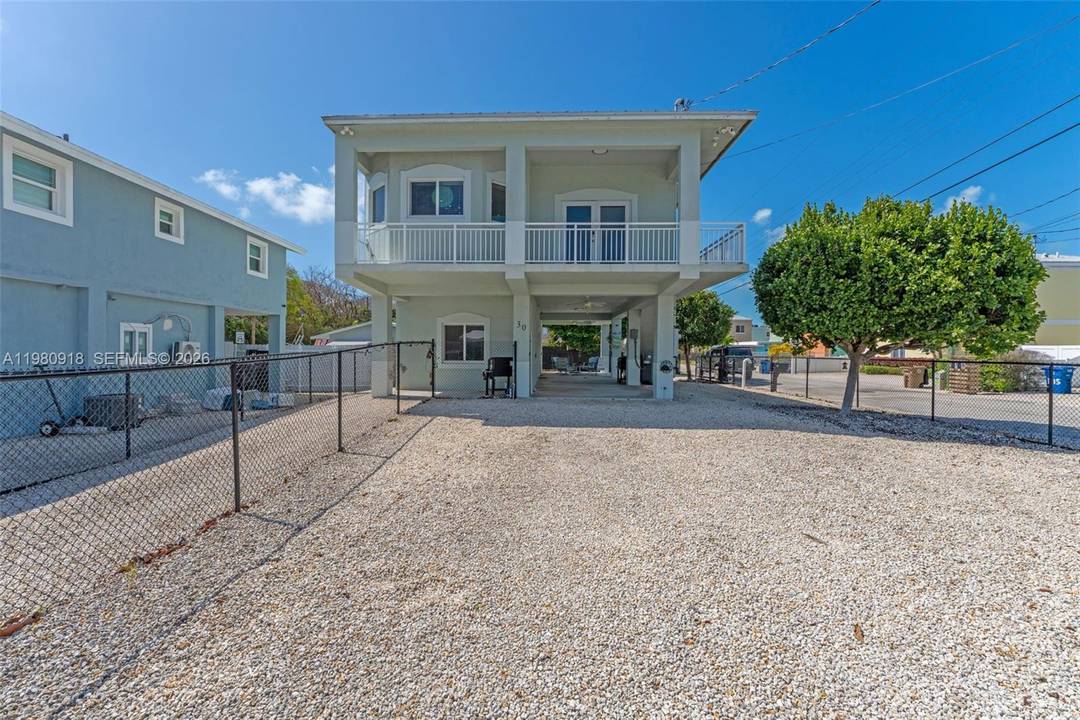 Desirable Multi Generational Island Home Near Private Bayfront Park X Flood Zone Welcome home to this spacious and beautifully maintained two story Key Largo residence, perfectly designed for multi generational ...