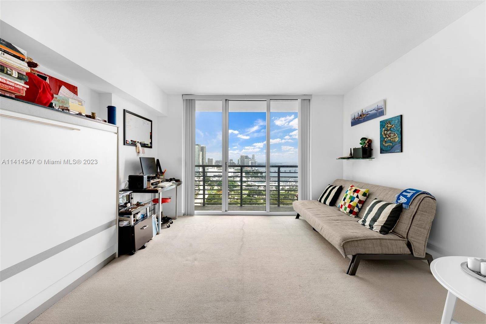 A beautiful studio at One Miami West with 507 interior square feet, a balcony, granite countertops, stainless steel kitchen appliances, in unit washer dryer, walk in closet, and floor to ...