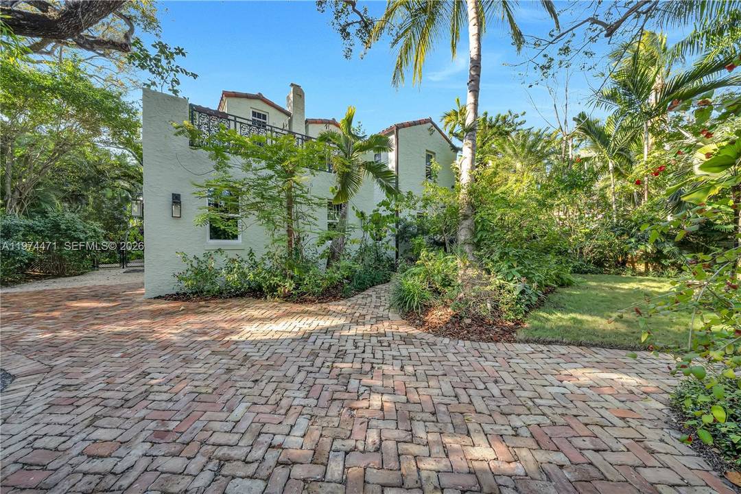 Welcome to 1720 Espan ola Dr, a charming Mediterranean style residence that captures the timeless character and warmth of Coconut Grove.