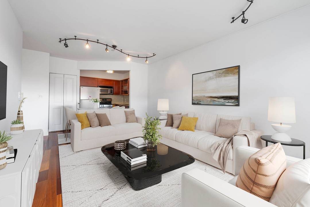 Golden light, open sky, and waterfront sunsets define Residence 6D at The Hallet's Cove Condominium.