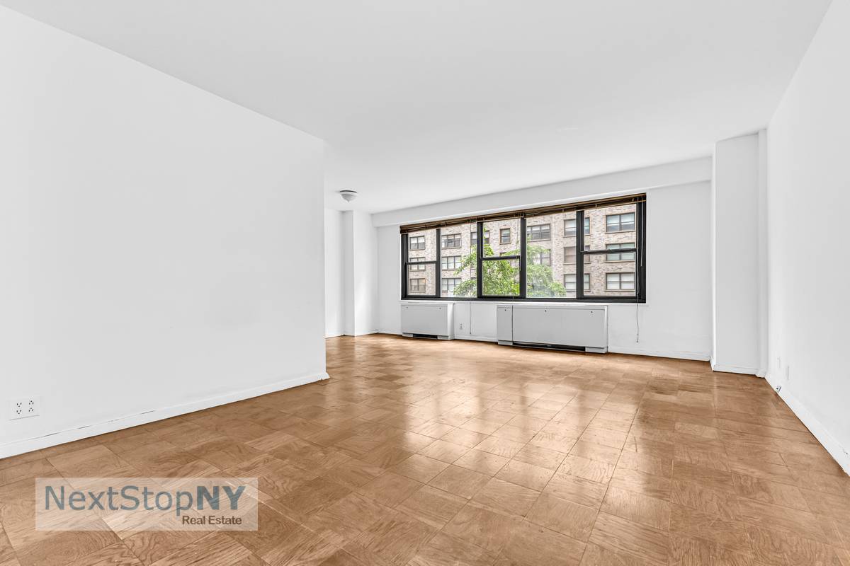 Discover this charming alcove studio apartment, available through an estate sale and sold as is, ideally located on East 57th Street in the heart of Manhattan.