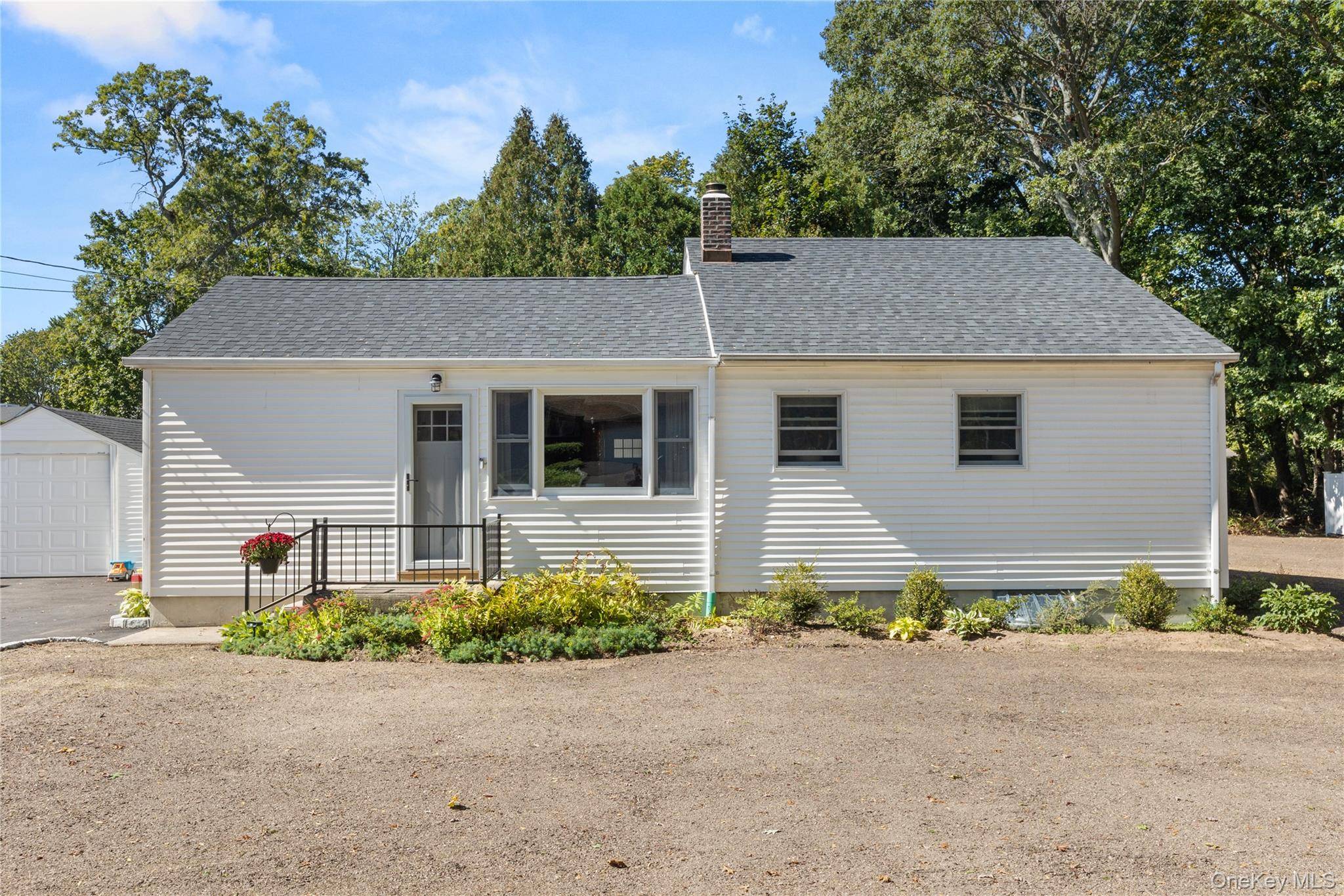 Charming and fully updated Ranch featuring 3 bedrooms and 2 full bathrooms.
