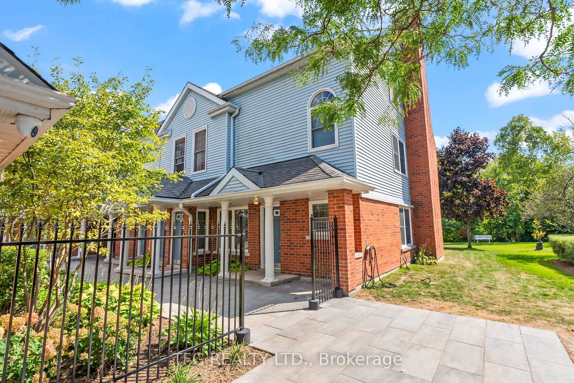 Welcome to this bright and spacious end unit condo townhouse offering convenient one level living !