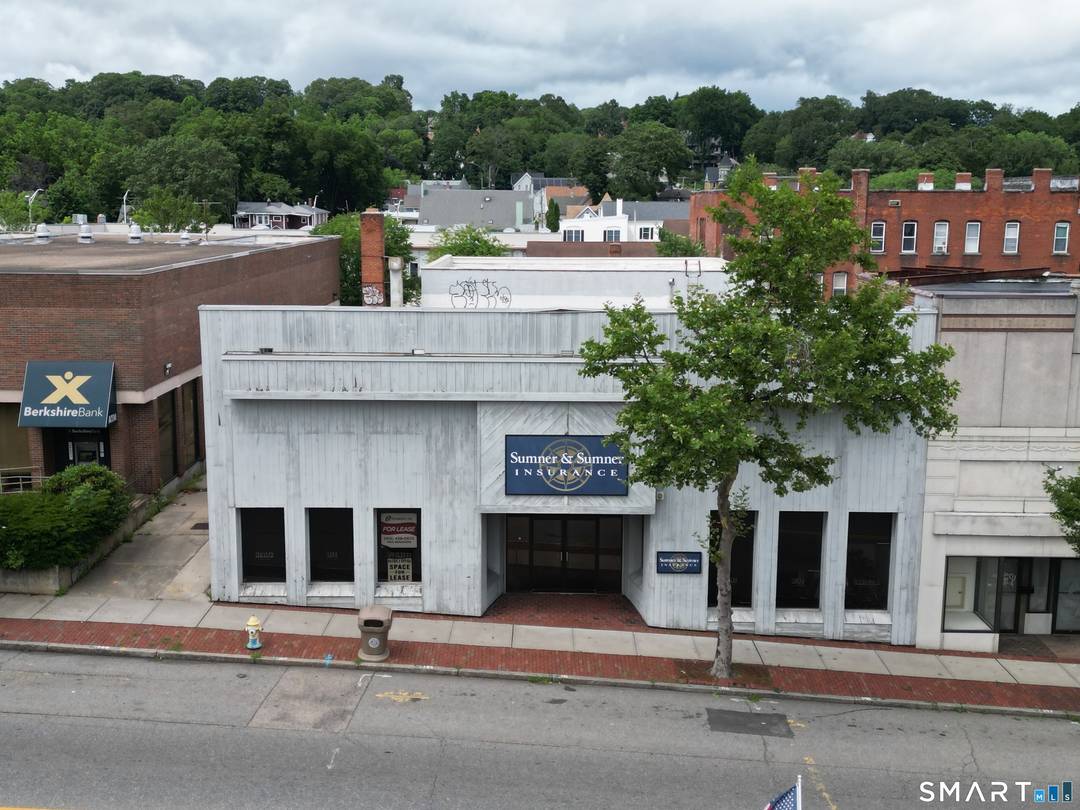 Downtown office or potential retail building for sale in Windham CT's Willimantic CDP.