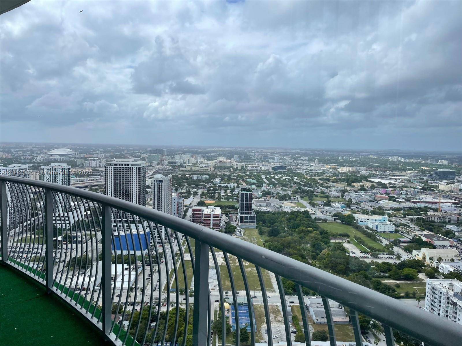 Penthouse 2 bed 2 bath split floor plan at The Opera Tower by Rolando Llanes.