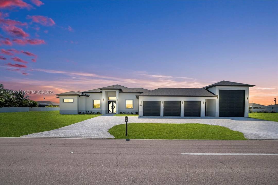 LUXURY POOL SPA 3 CAR GARAGE RV PARKING 302 El Dorado Blvd N is not your average Cape Coral home.