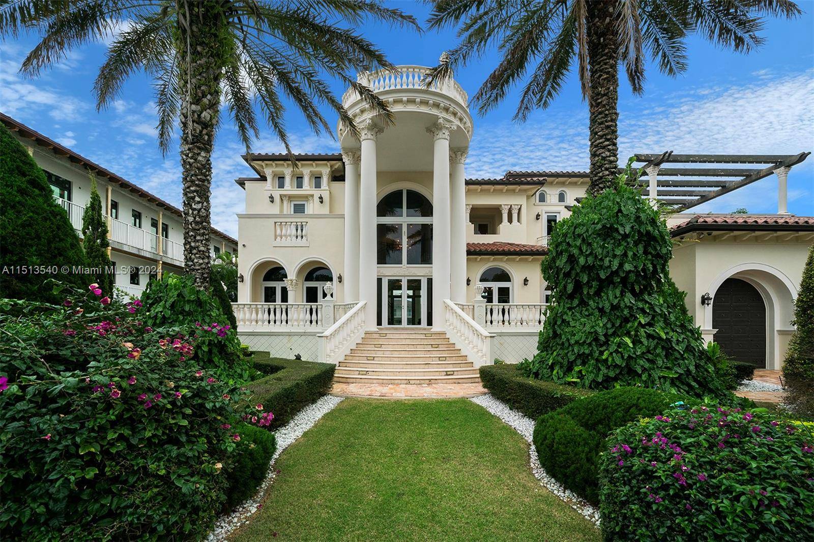 This exquisite 2 story waterfront mansion boasts five bedrooms and four bathrooms.