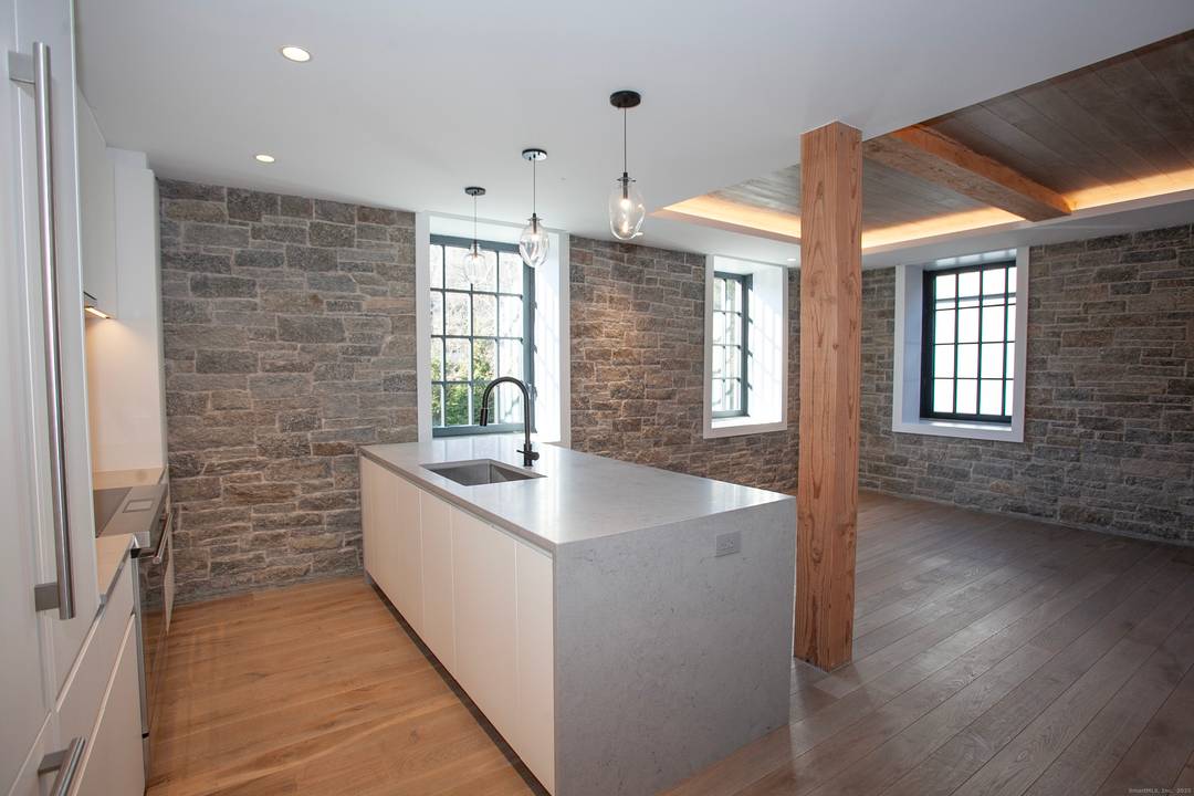 Welcome to Residence 209 at The Mill Westport, offering high end luxury living with all the amenities of a fine custom home in the heart of downtown.