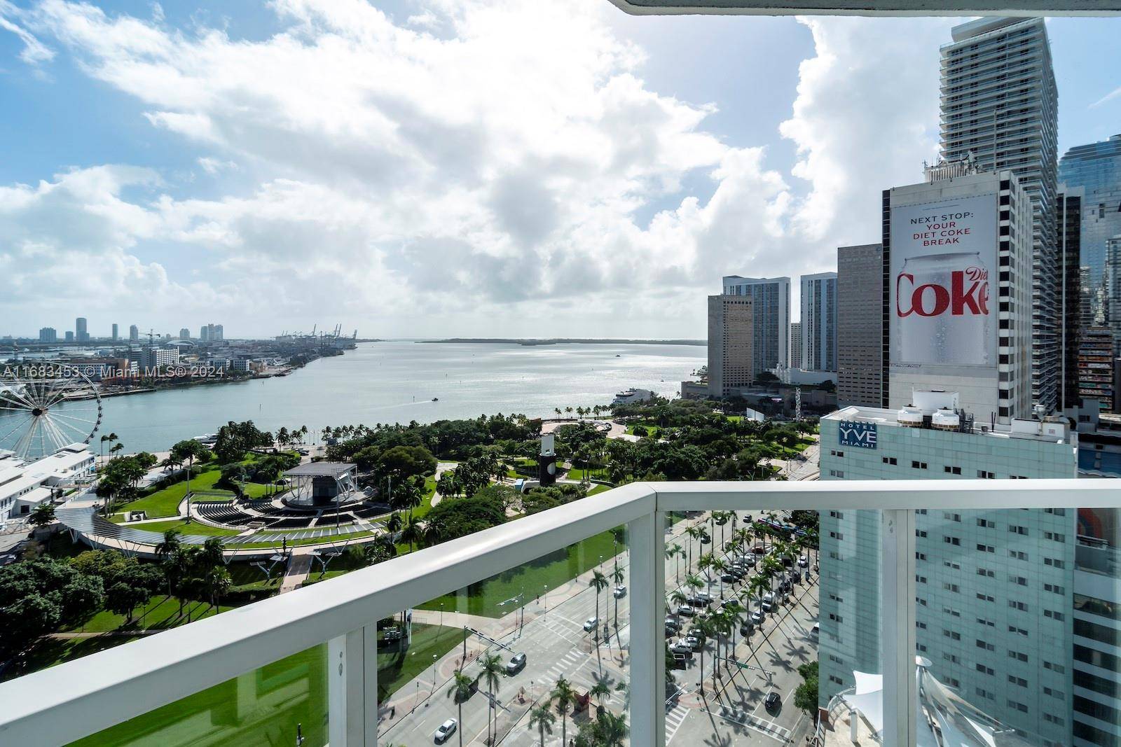 PRICED TO SELL ! This Huge 2BD 2BA DEN corner residence with breathtaking views of the bay and the Port of Miami.