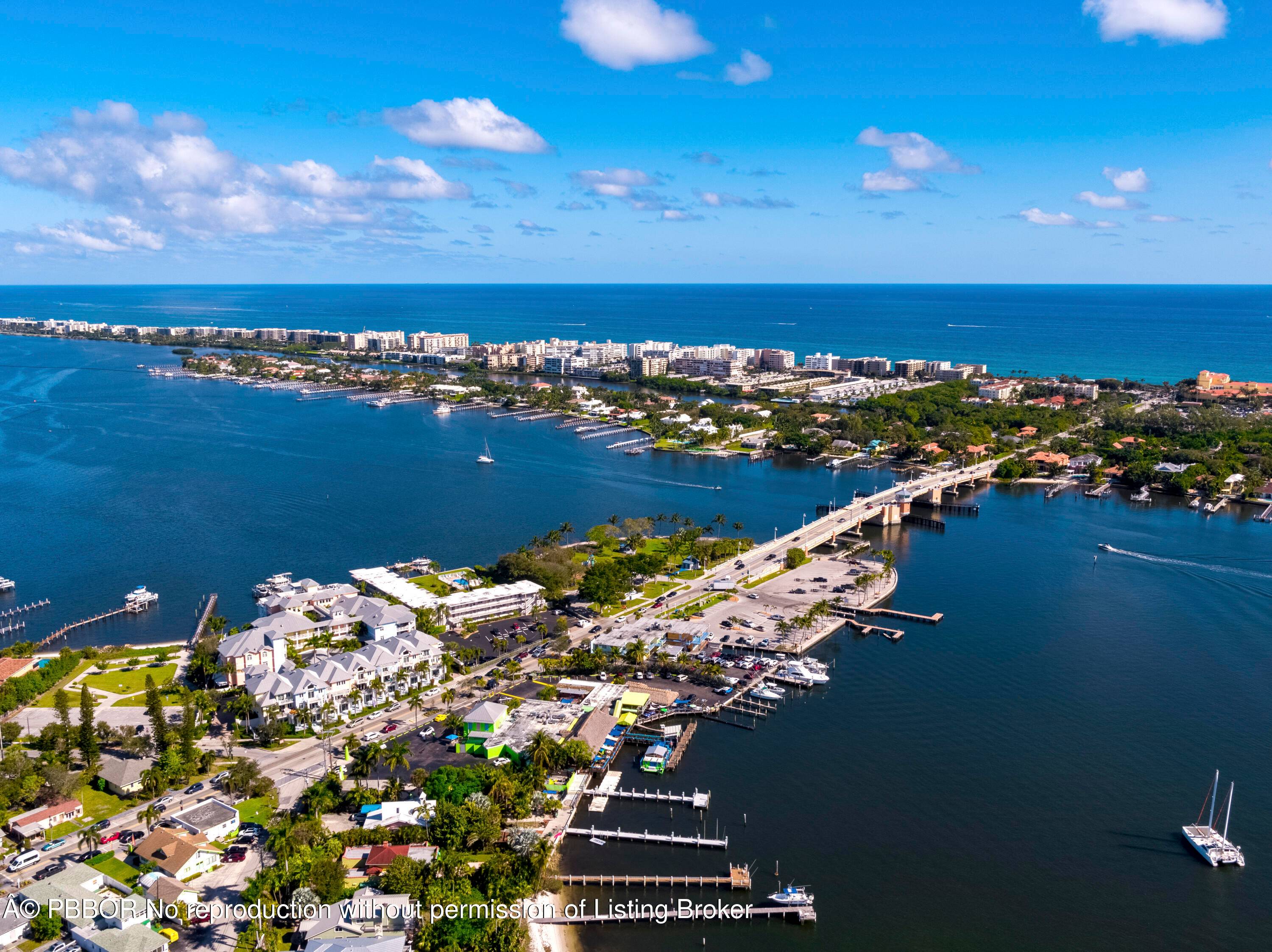 Experience the charm and spaciousness of this uniquely designed Key West style condominium, thoughtfully laid out to feel like a sprawling 2700 SF single family home.