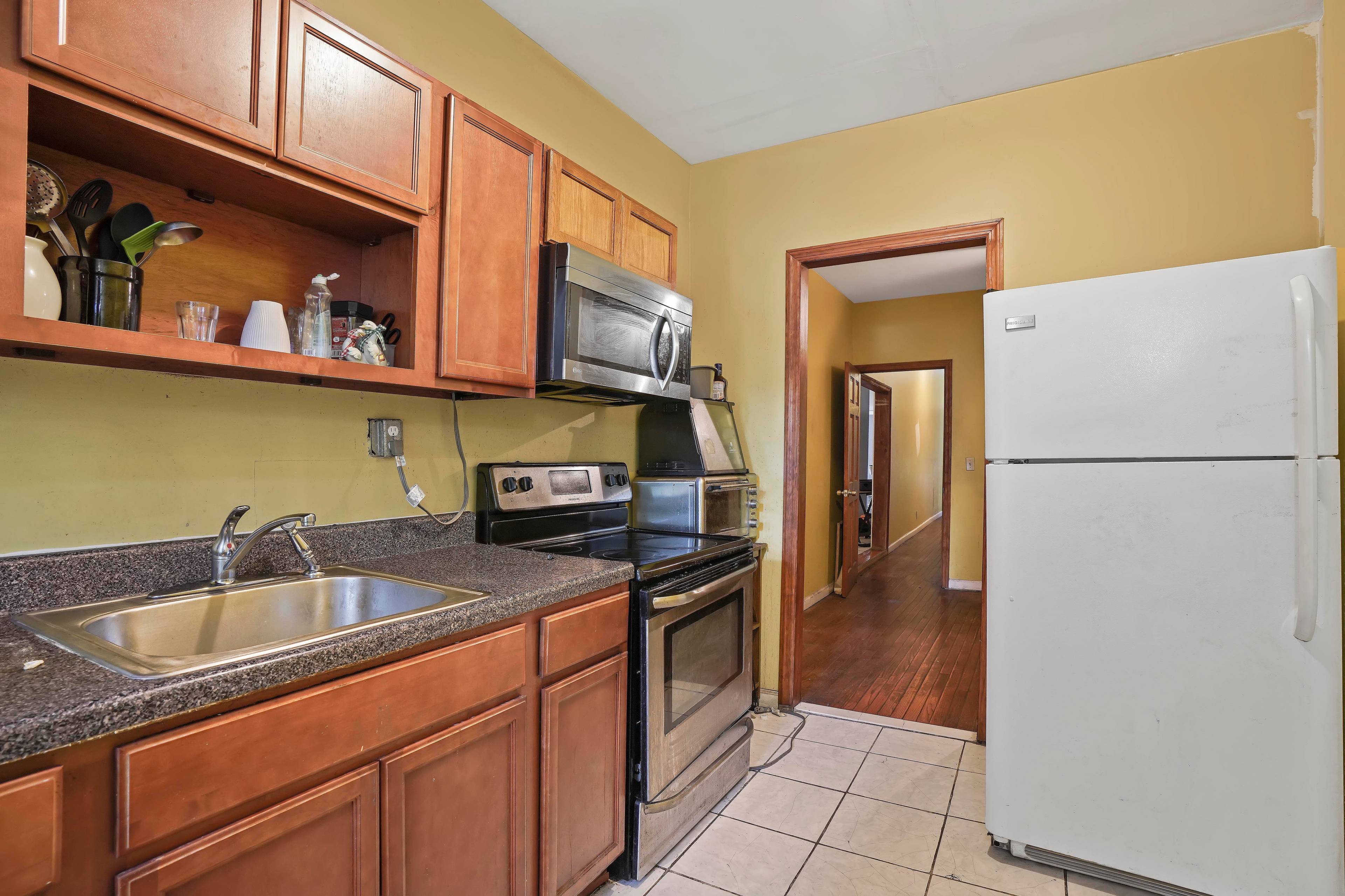 A stately four family mixed use building spans an impressive 5, 514 square feet, delivered vacant and ideal for savvy investors, primary residents, or those looking to establish a business ...