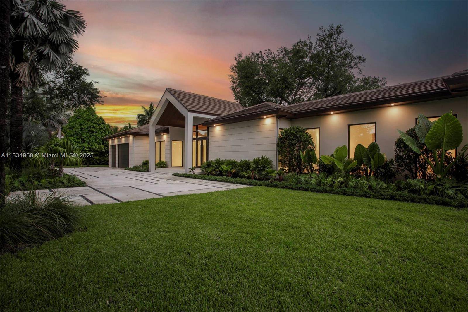 Stunning new construction in the desirable residential enclave of Miller Drive Estates.