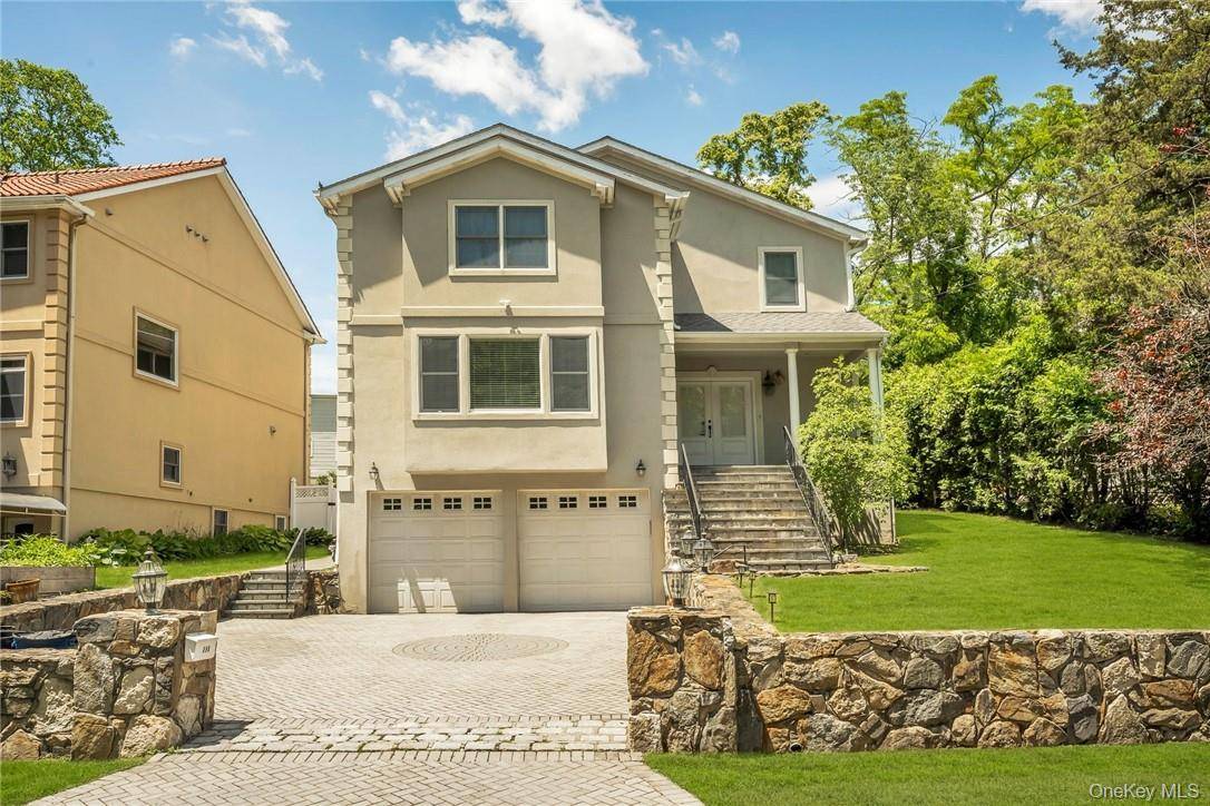 Discover this Colonial home nestled in one of White Plains' most coveted neighborhoods Haviland Manor.
