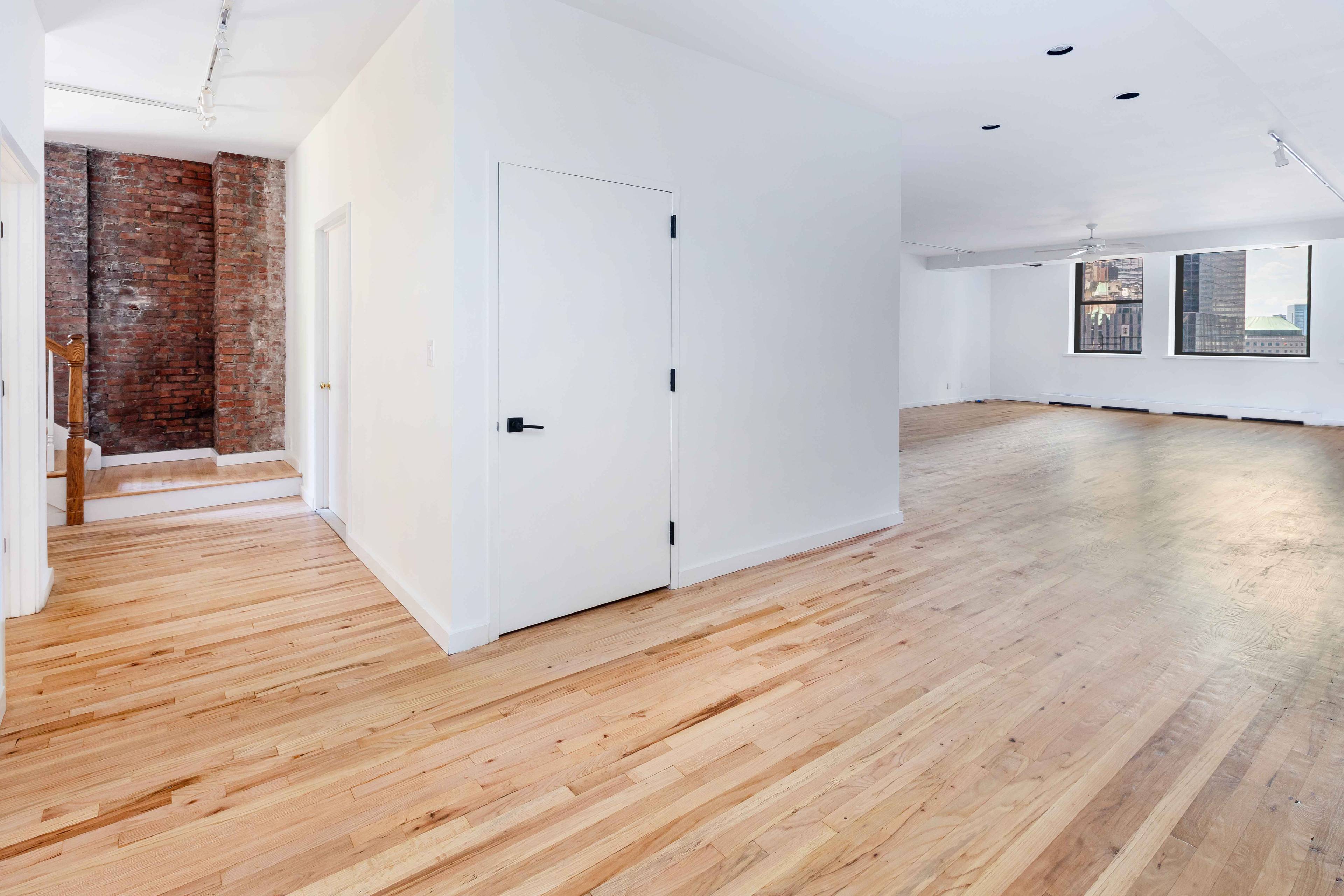 This timeless prewar loft in the heart of FiDi offers classic New York charm.